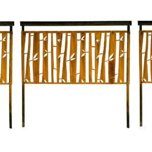 A set of three metal headboards with bamboo design.