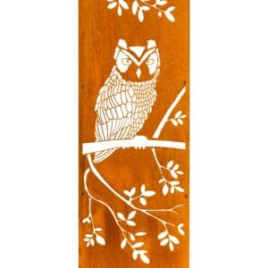 A painting of an owl on the side of a tree.