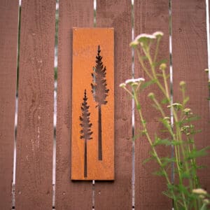 A wooden sign with two trees on it