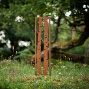 Rusted metal panel with tree cutouts