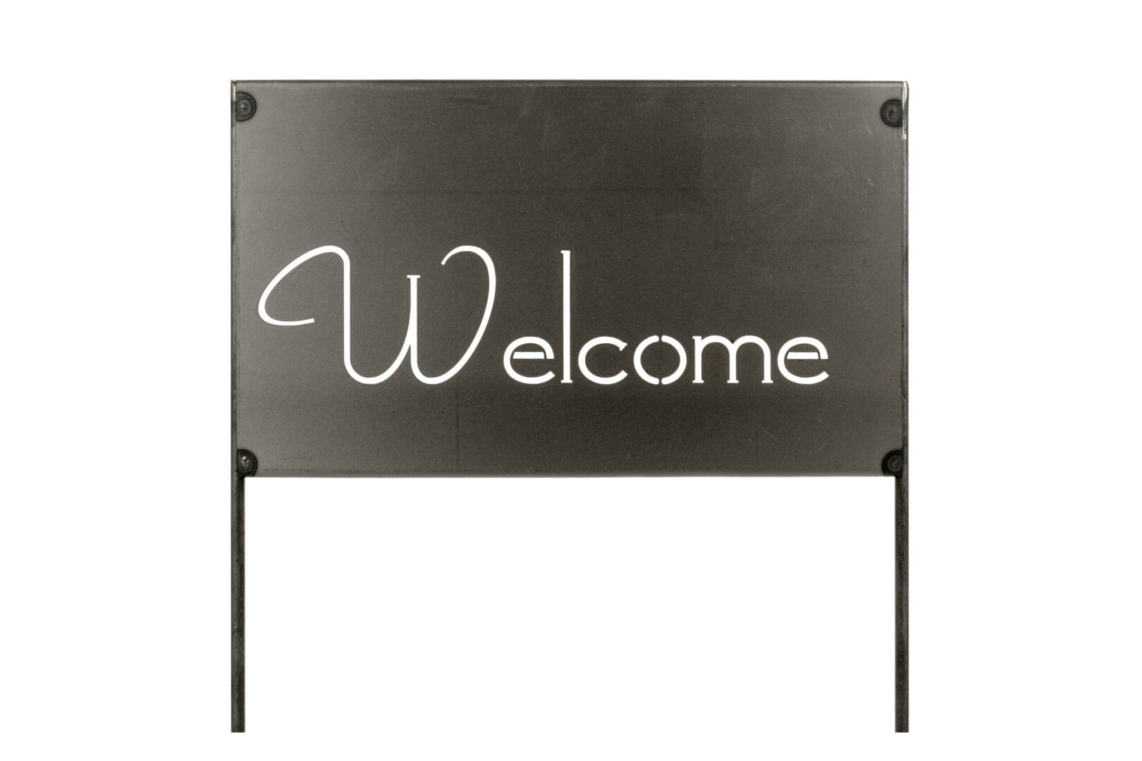 Black welcome sign with white script on stakes