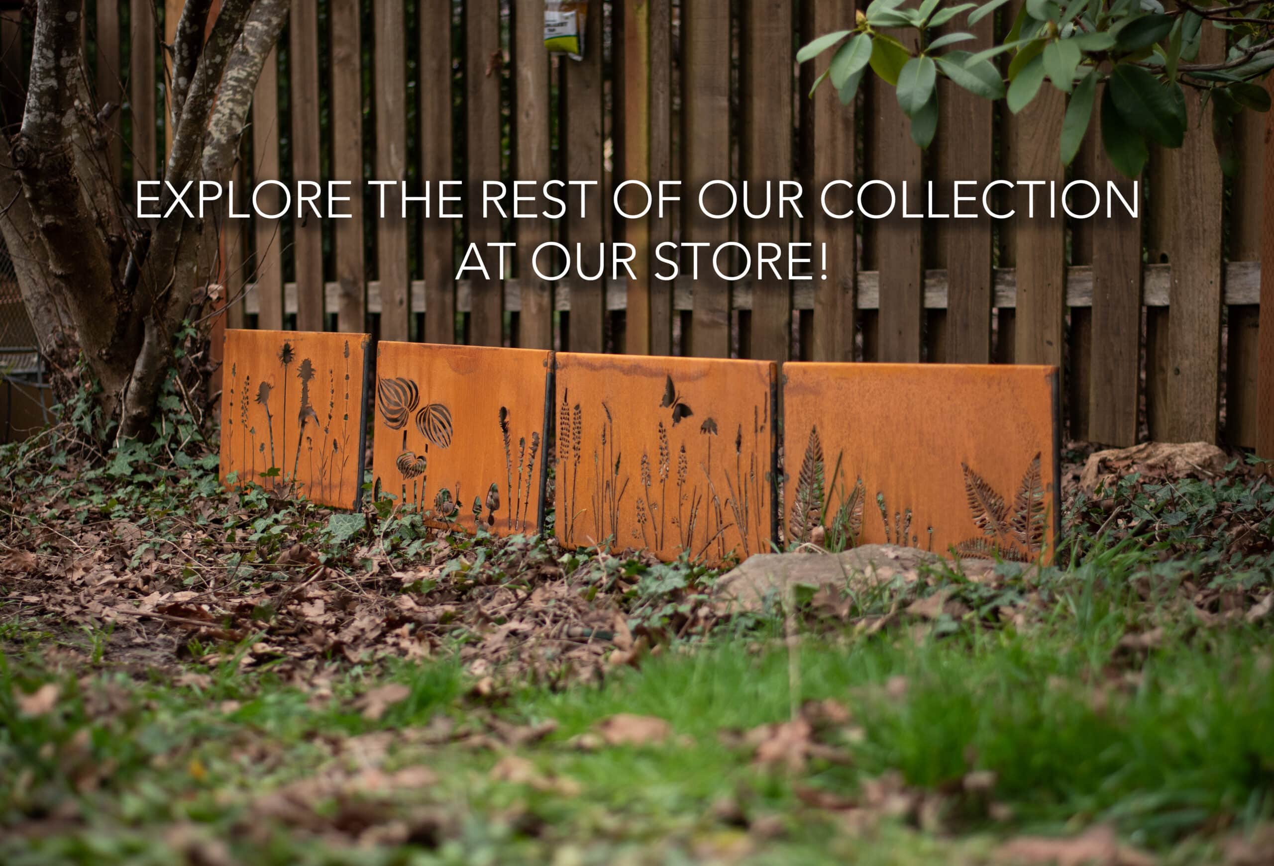 Rust colored metal garden panels by fence